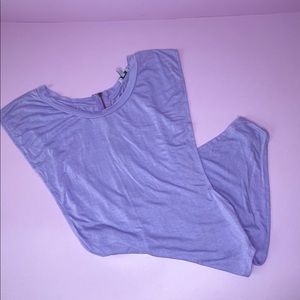 BRAND NEW, NEVER BEEN WORN! Lavender bodysuit. Open on the sides. Size medium